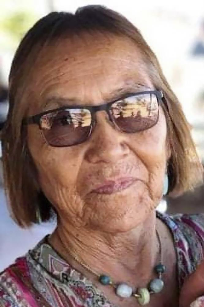 In this undated photo provided by her niece Seraphine Warren, Navajo rug weaver Ella Mae Begay, 62, is shown. Begay is one of thousands of missing Indigenous women in the U.S. Warren is organizing a 150-mile walk starting at Begay's home in the Navajo Nation community of Sweetwater, Ariz., on Tuesday, Sept. 28, 2021, to draw attention to the case amid renewed calls to highlight missing people of color following widespread coverage of a white woman who disappeared in Wyoming. (AP Photo)