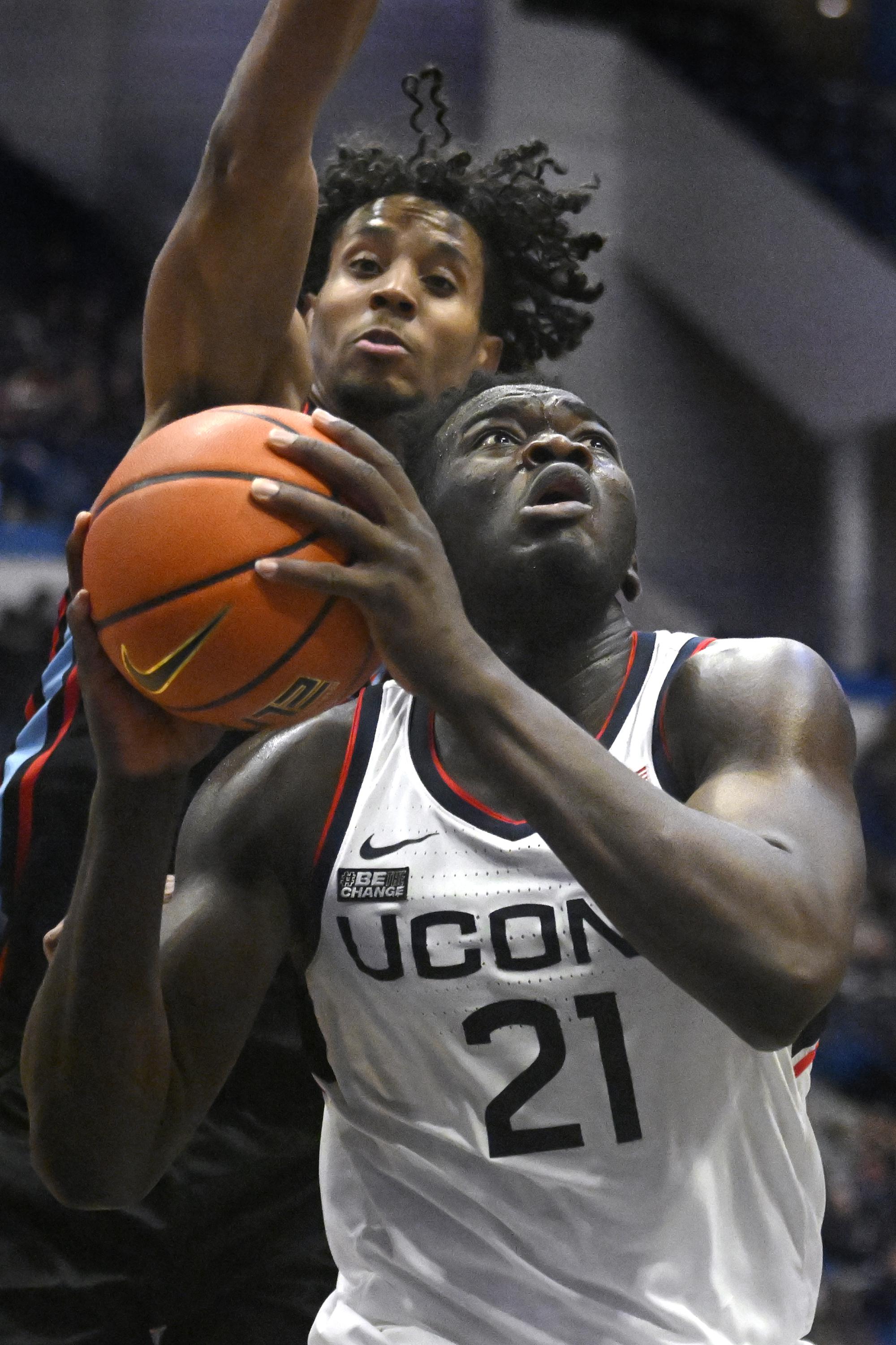 Sanogo leads unbeaten UConn past Delaware State 95-60