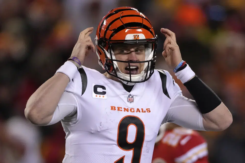 Cincinnati Bengals quarterback Joe Burrow calls an audible against the Kansas City Chiefs during the first half of the NFL AFC Championship playoff football game, Sunday, Jan. 29, 2023, in Kansas City, Mo. (AP Photo/Jeff Roberson)