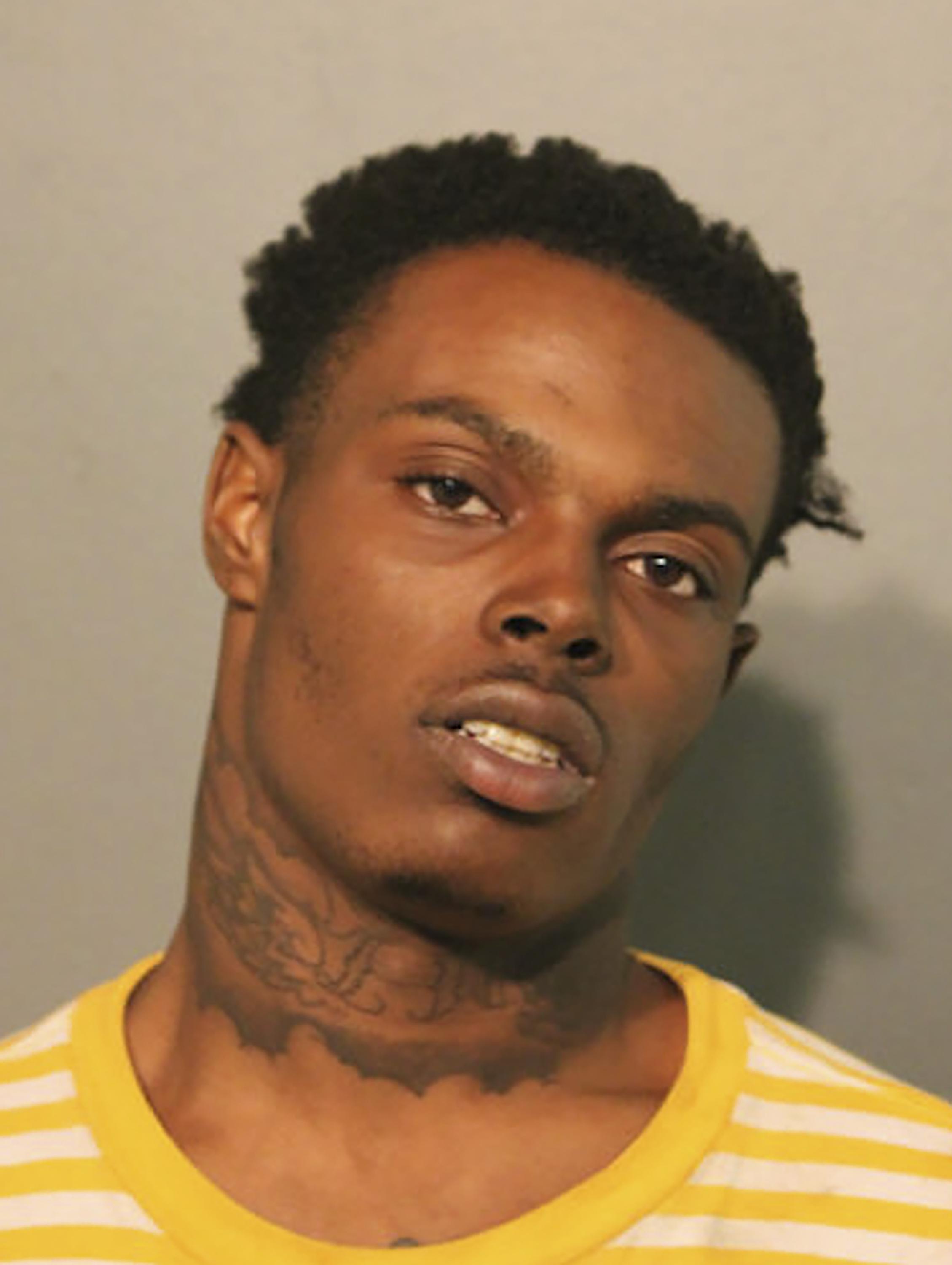 Two men charged in fatal Chicago shopping district shooting AP News