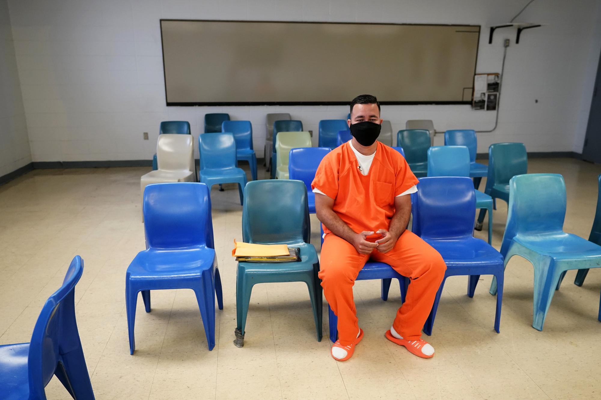 Immigration detainee Alexander Martinez speaks during an interview with The Associated Press inside the Winn Correctional Center in Winnfield, La., Friday, July 30, 2021.  Martinez says he fled from homophobia, government persecution and the notorious MS-13 gang in El Salvador only to run into abuse and harassment in America’s immigration detention system. (AP Photo/Gerald Herbert)