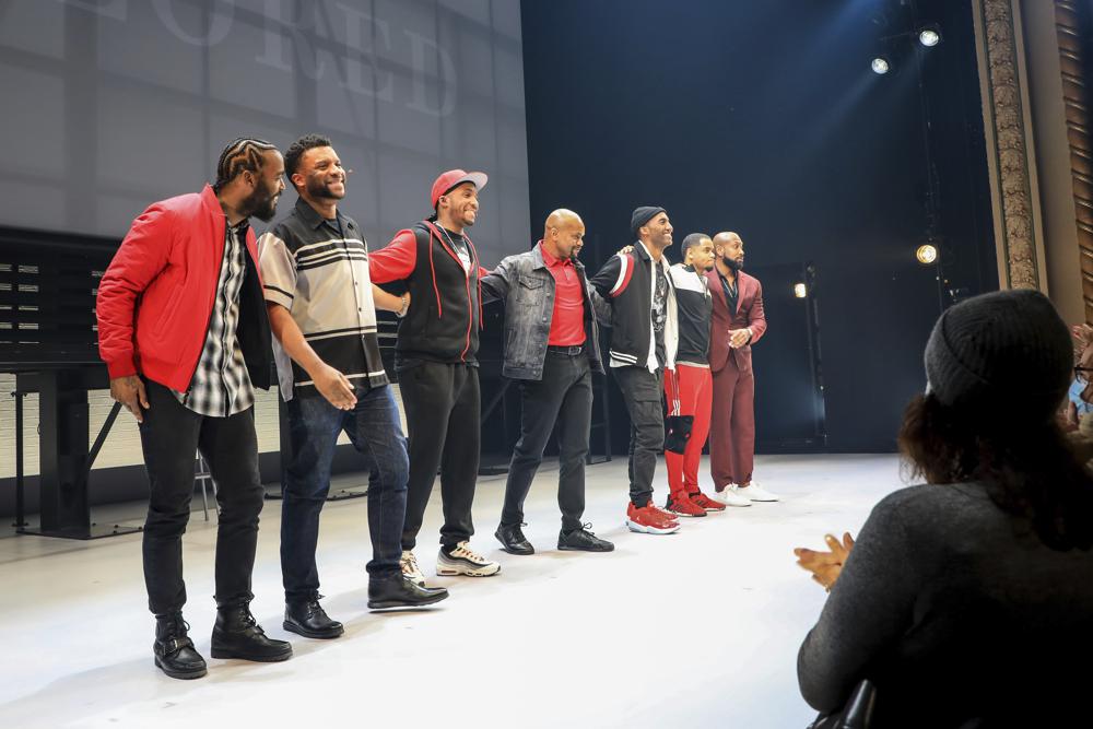 This image provided by Thoughts of a Colored Man shows  Luke James, from left, playwright Keenan Scott II, Bjorn DuPaty, Forrest McClendon, Garrett Turner, Tristan Mack Wilds, and Bryan Terrell Clark performing in “Thoughts of a Colored Man” on Dec. 21, 2021 in New York. (Thoughts of a Colored Man/Tricia Baron via AP)