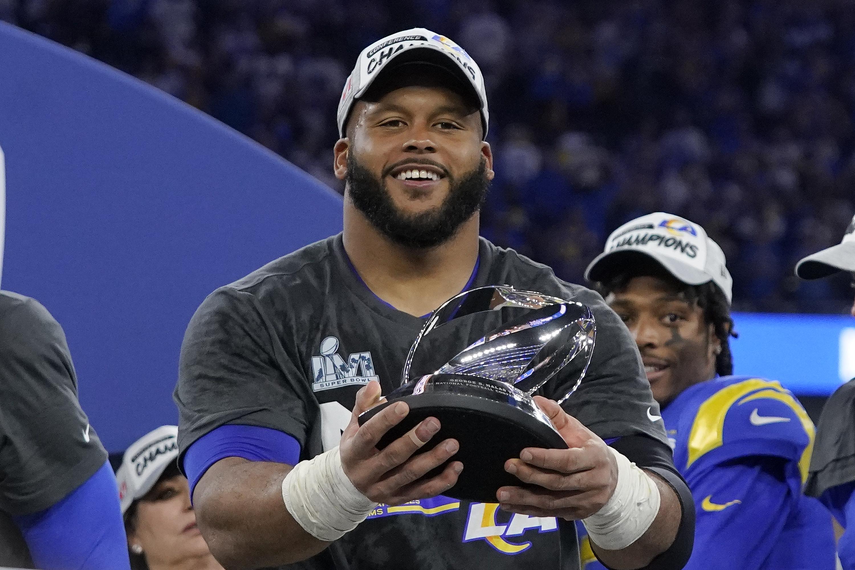 Rams determined to Aaron Donald a Bowl champ | AP News