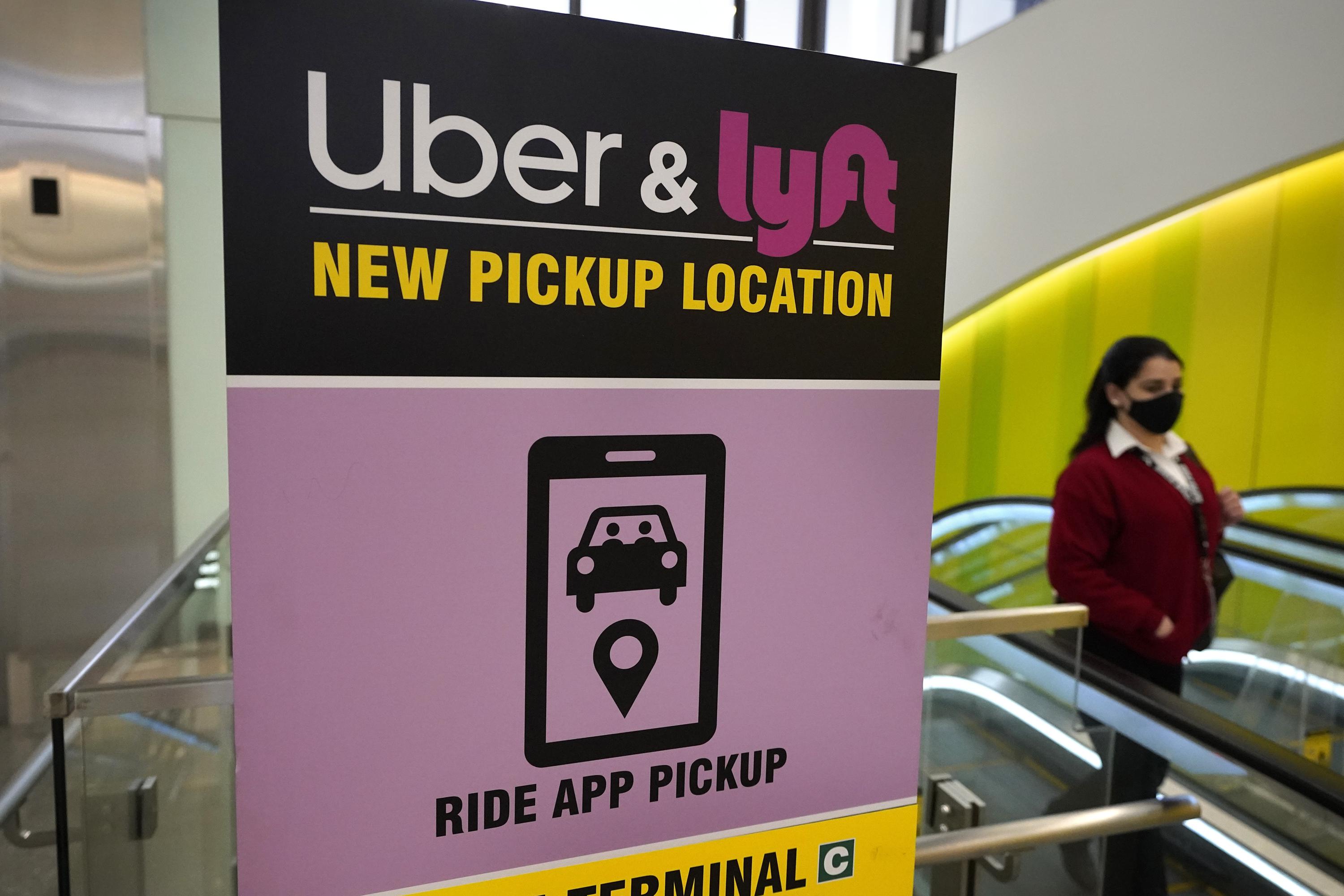 Lyft, Uber to cover fees for drivers sued under Texas law | AP News