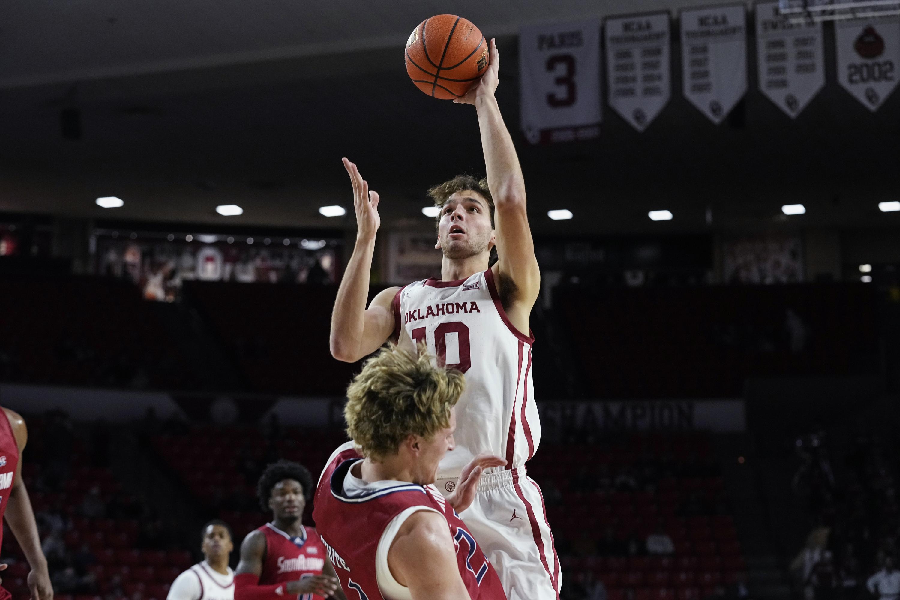 Jacob Groves' late 3 lifts Oklahoma past South Alabama 64-60 | AP News