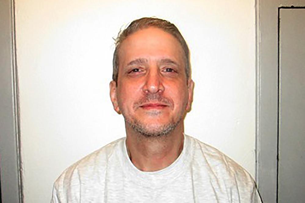 This Feb. 19, 2021, photo provided by Oklahoma Department of Corrections shows Richard Glossip. Glossip has tied the knot in prison. The 59-year-old who was convicted of a 1997 murder-for-hire married his 32-year-old fiance Lea Rodger on Tuesday inside the state penitentiary in McAlester. It is the second prison marriage for Glossip. He divorced his first wife last year. (Oklahoma Department of Corrections via AP)