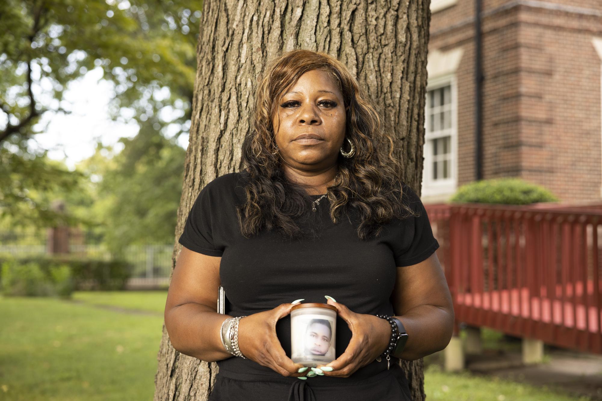 Shineka Crawford stands outside the Prince Hall Grand Lodge in Philadelphia on Monday, Aug. 23, 2021, where she came to drop off a memento of her son, Shaquille Barbour, 18, to The Gun Violence Memorial Project. Shaquille was shot 13 times and killed while riding his bike. (AP Photo/Ryan Collerd)