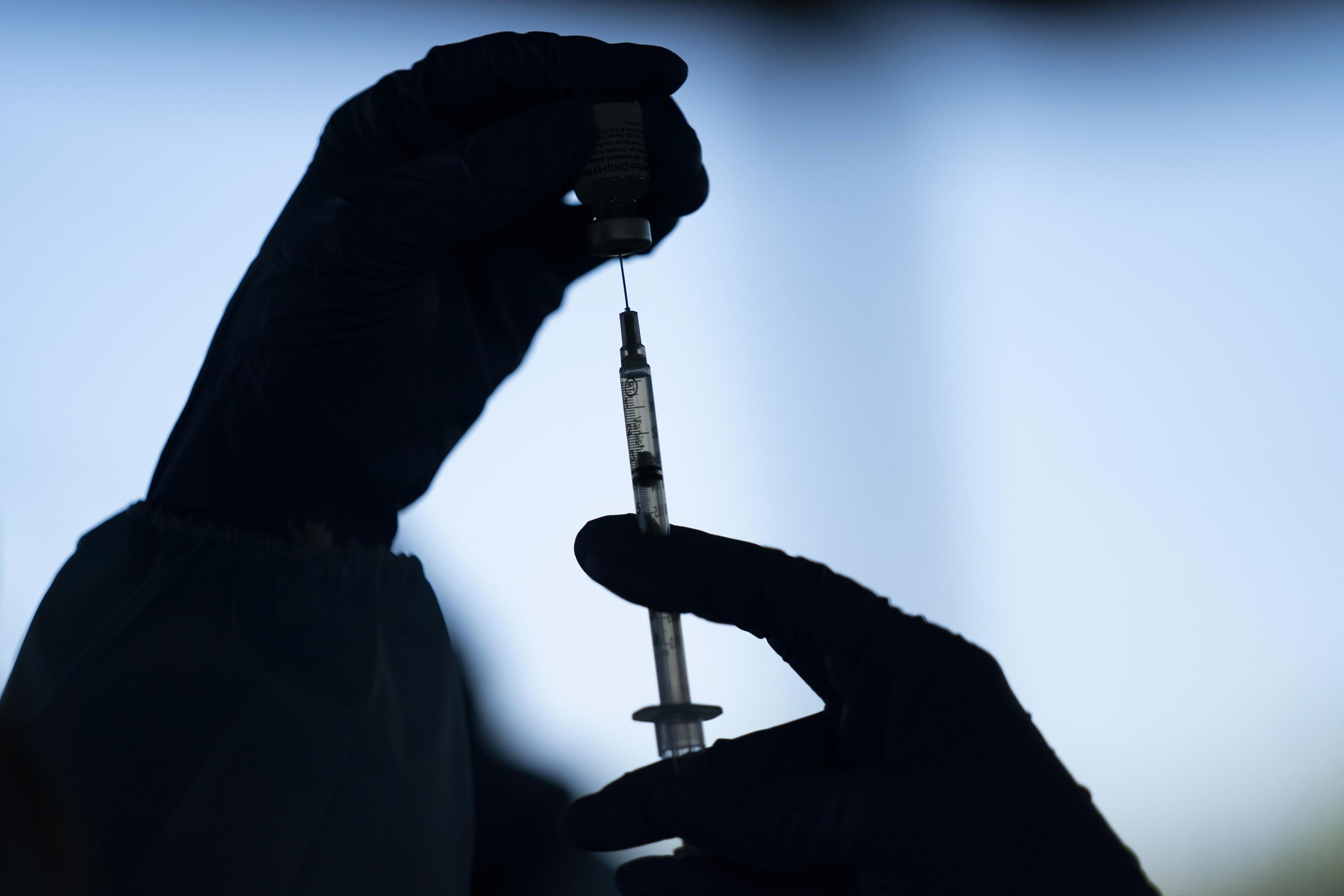 UK doctors seek review of 12-week gap between vaccine doses - The Associated Press