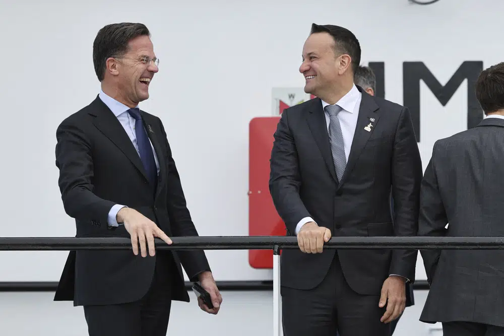 Netherland's Prime Minister Mark Rutte, left, and Ireland's Prime Minister Leo Varadkar smile during the North Sea Summit in Ostend, Belgium, Monday, April 24, 2023. Leaders gather on Monday in the hopes of expanding a collective ambition to harness the full energy and industrial potential of the North Sea and make it the largest powerhouse of Europe by 2050. (AP Photo/Geert Vanden Wijngaert)
