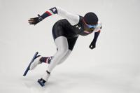 Erin Jackson of the United States skates during a speedskating practice session at the 2022 Winter Olympics, Wednesday, Feb. 9, 2022, in Beijing. (AP Photo/Gerald Herbert)