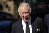 FILE - King Charles III arrives to thank emergency service workers for their work and support ahead of the funeral of Queen Elizabeth II at the Metropolitan Police Service Special Operations Room in London, Saturday, Sept. 17, 2022. King Charles III has decided not to attend the international climate change summit COP27 taking place on Nov. 16-18 in Egypt, fueling speculation that the new monarch will have to rein in his environmental activism now that he has ascended the throne. (AP Photo/Christophe Ena, File)