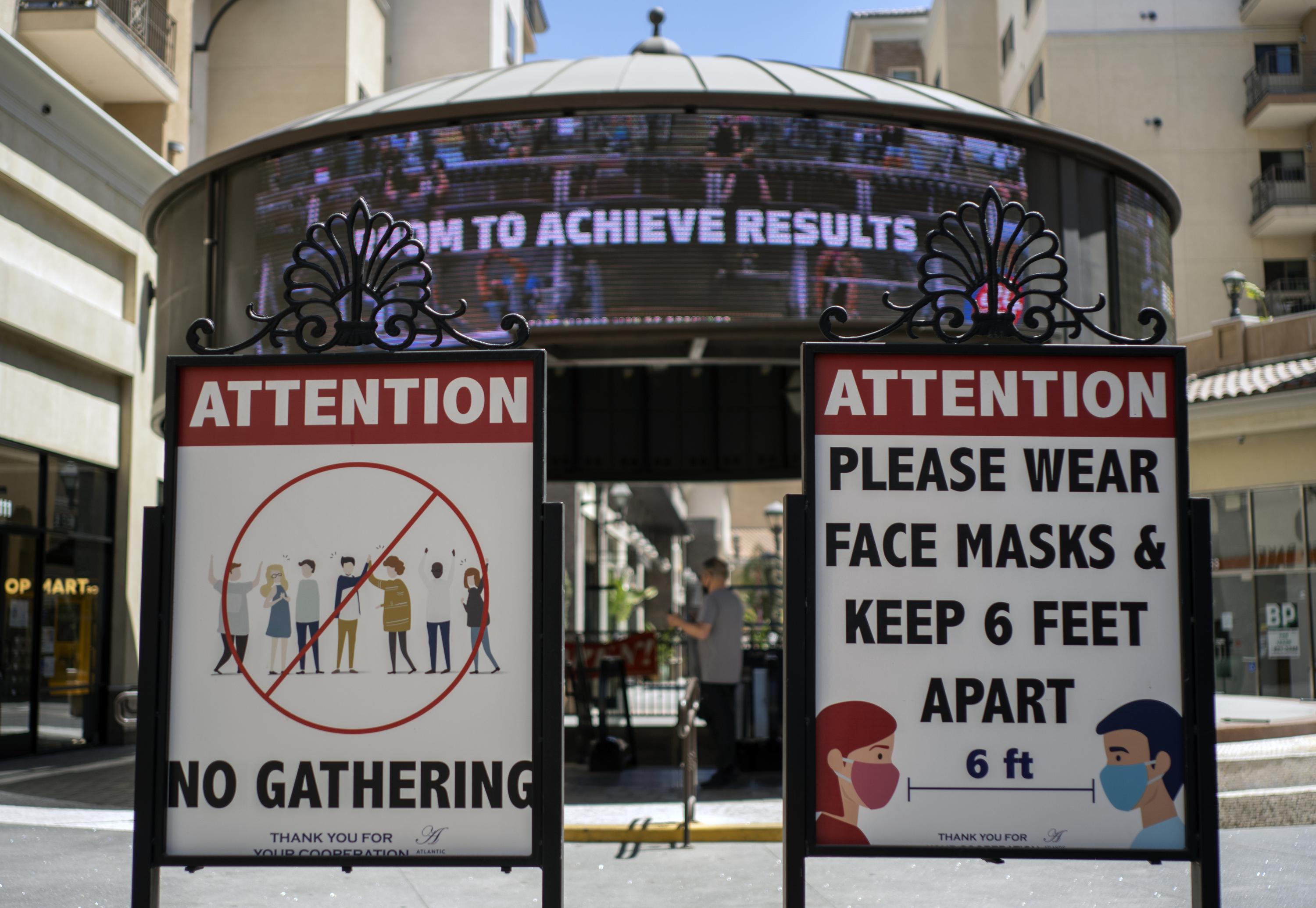 California brings back mask mandate as virus cases rise AP News