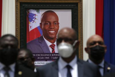 Foto tomada el 21 de julio del 2021 de funcionarios en el funeral del presidente haitiano Jovenel Moise en Puerto Príncipe.  (Foto AP/Joseph Odelyn, File)