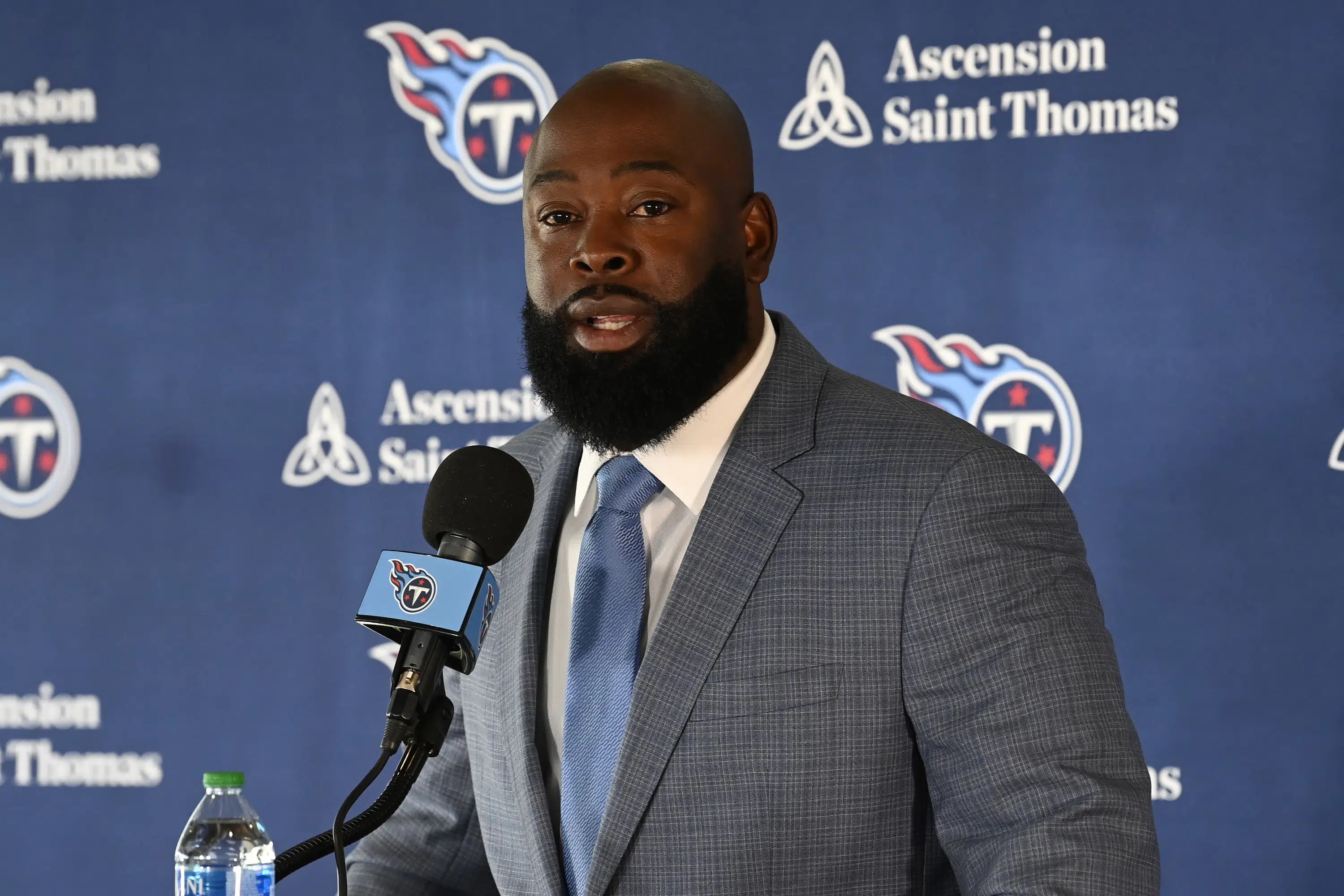 Titans release Lewan, Woods, Bullock to clear up cap space | AP News