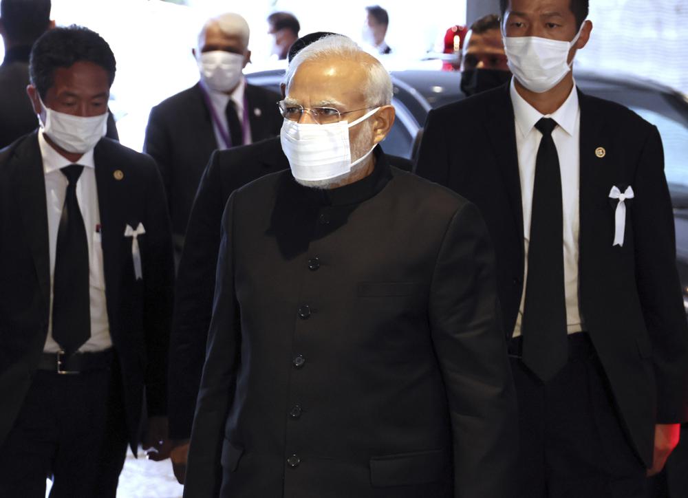 Indian Prime Minister Narendra Modi arrives at the Budokan hall to attend the state funeral of former Japanese Prime Minister Shinzo Abe in Tokyo Tuesday, Sept. 27, 2022. (Yoshikazu Tsuno/Pool Photo via AP)