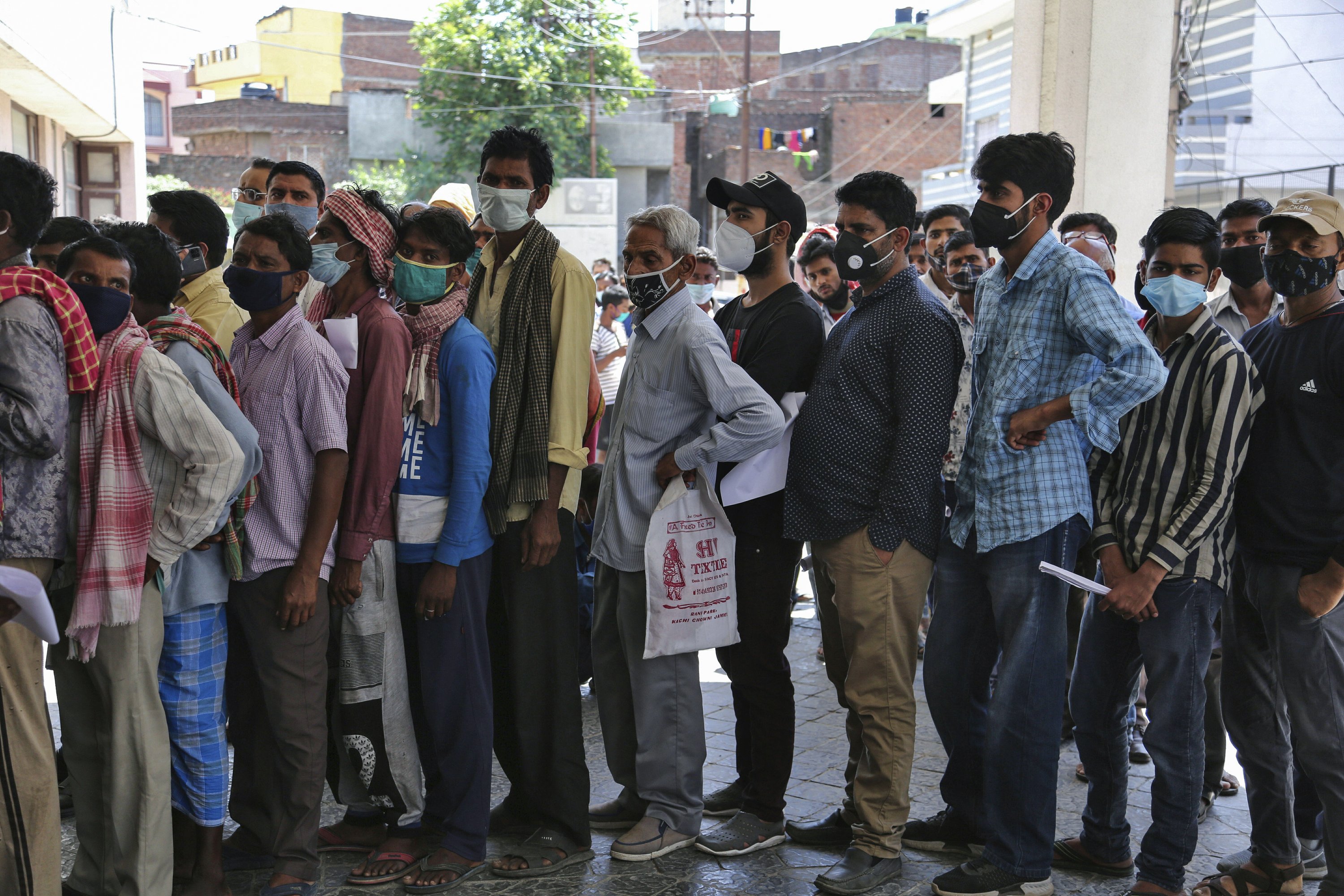 India’s capital to close amid devastating virus surge