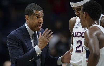 Arbitrator: UConn coach Ollie improperly fired; owed $11M | AP News