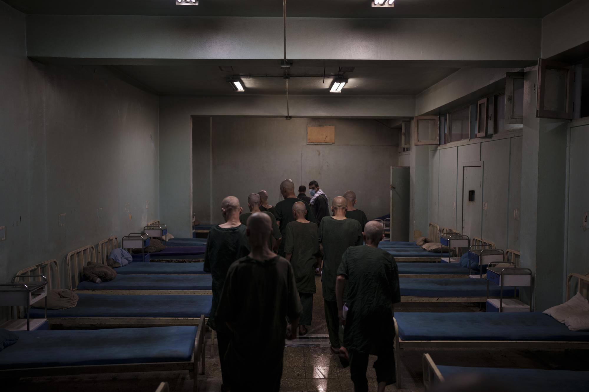 Taliban invokes Islam to weed out drugs from Afghanistan war begins with shaved heads for addicts