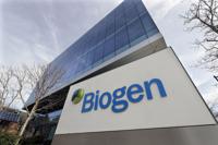 FILE — The Biogen Inc., headquarters is shown March 11, 2020, in Cambridge, Mass.  Shares of Biogen and other drugmakers researching Alzheimer’s disease soared early Wednesday, Sept. 28, 2022, after Japan’s Eisai Co. said its potential treatment appeared to slow the fatal disease’s progress in a late-stage study. Eisai announced results late Tuesday from a global study of nearly 1,800 people with early-stage Alzheimer’s (AP Photo/Steven Senne, File)