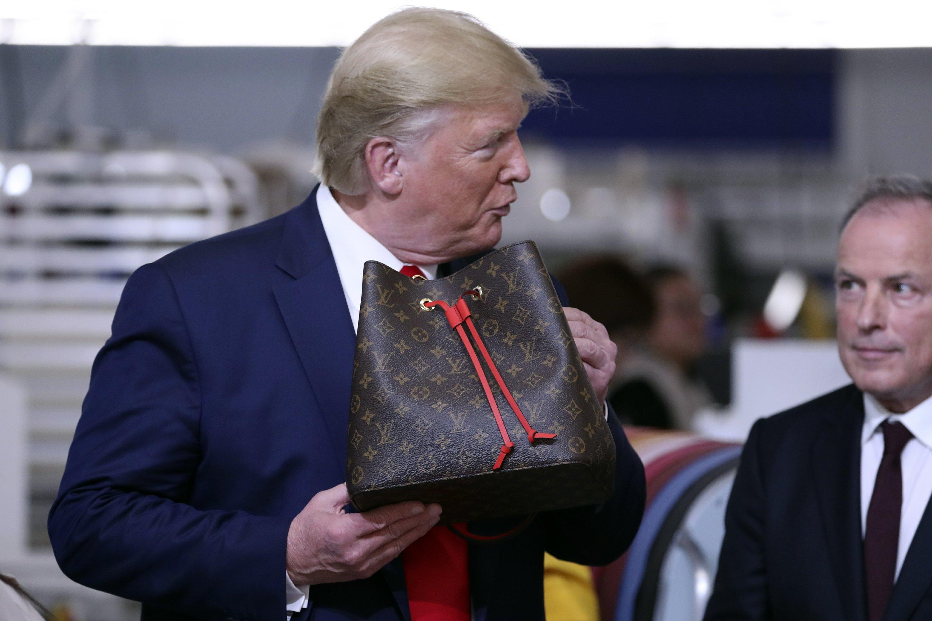 In Texas, Trump tours Louis Vuitton workshop ahead of rally