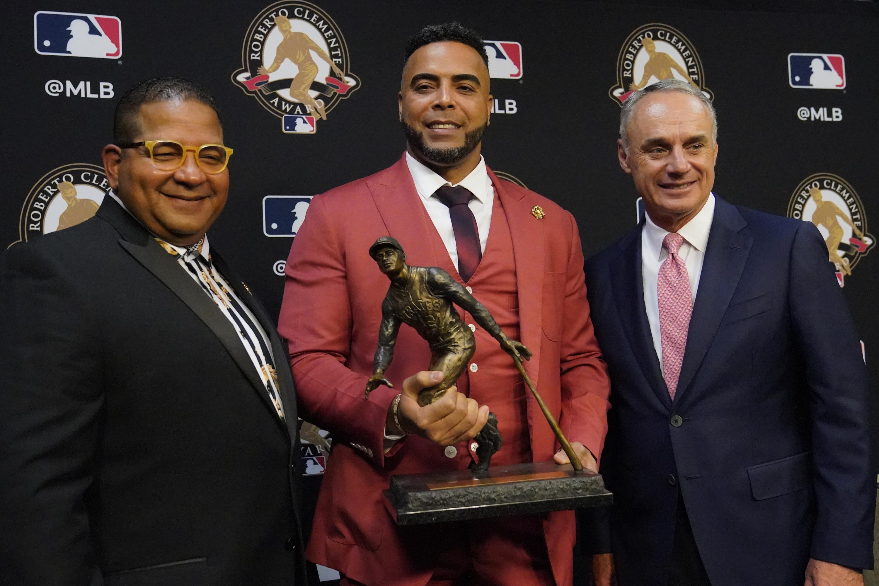 Cruz wins MLB's Roberto Clemente Award for philanthropy AP News