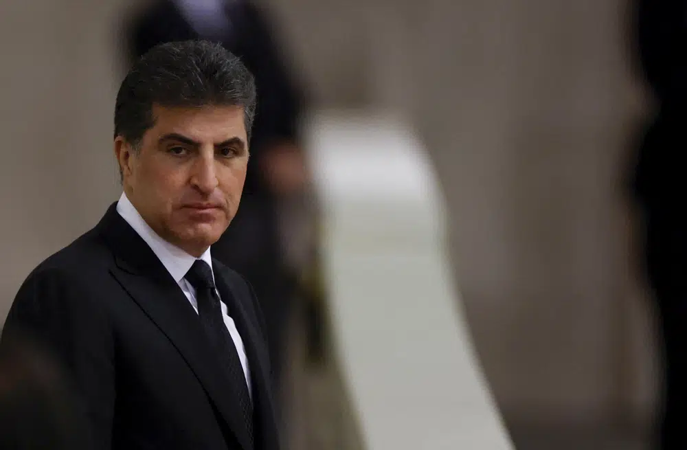 FILE - President of the Kurdistan region in Iraq, Nechirvan Barzani pays his respects to Britain's Queen Elizabeth II, following her death, during her lying in state at Westminster Hall, in Westminster Palace, in London, Sunday, Sept. 18, 2022. Iraqi Kurdish authorities on Thursday, Jan. 26, 2023, pushed back against a decision by Iraq's top court that blocked payments from the central government funding the semi-autonomous region. (John Sibley/Pool Photo via AP, File)