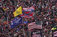 FILE - People listen as President Donald Trump speaks during a rally Jan. 6, 2021, in Washington. (AP Photo/Evan Vucci, File)