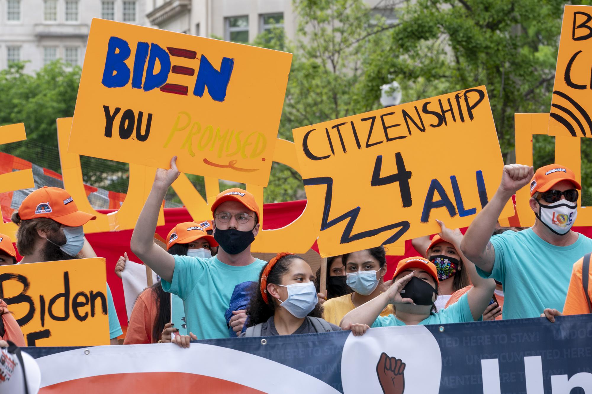 FILE - Supporters of immigration reform march while asking for a path to citizenship and an end to detentions and deportations, April 28, 2021, in Washington. Biden took office on Jan. 20 and almost immediately, numbers of migrants exceeded expectations. (AP Photo/Jacquelyn Martin, File)