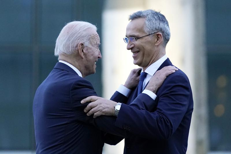 FILE - In this June 14, 2021 file photo, President Joe Biden and NATO Secretary General Jens Stoltenberg speak while visiting a memorial to the September 11 terrorist attacks at NATO headquarters in Brussels. When U.S. President Joe Biden took office early this year, Western allies were falling over themselves to welcome and praise him and hail a new era in trans-Atlantic cooperation. The collapse of Kabul certainly put a stop to that. Even some of his biggest fans are now churning out criticism. (AP Photo/Patrick Semansky, File)