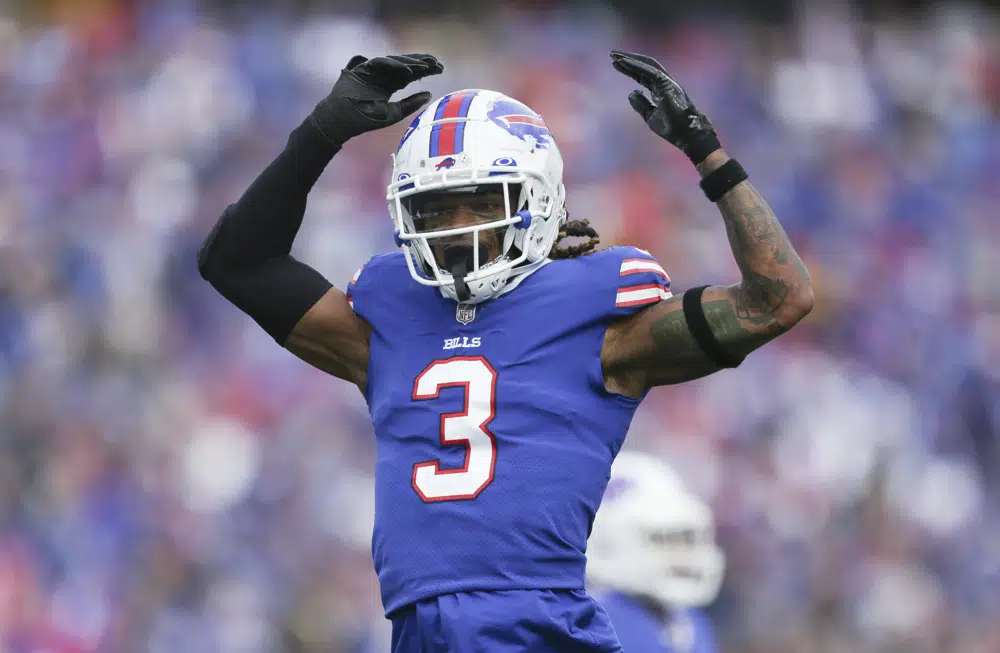 FILE - Buffalo Bills safety Damar Hamlin reacts after a play during the first half of the team's NFL football game against the Pittsburgh Steelers on Oct. 9, 2022, in Orchard Park, N.Y. President Joe Biden on Thursday, March 30, met Hamlin, a Buffalo Bills defensive player who went through cardiac arrest during a January game after making a tackle. Hamlin's collapse while playing against the Cincinnati Bengals caused football fans to shudder with concern and led to the cancelation of the game. The football player went to Washington to support a bill that would increase access to defibrillators in schools. (AP Photo/Joshua Bessex, File)
