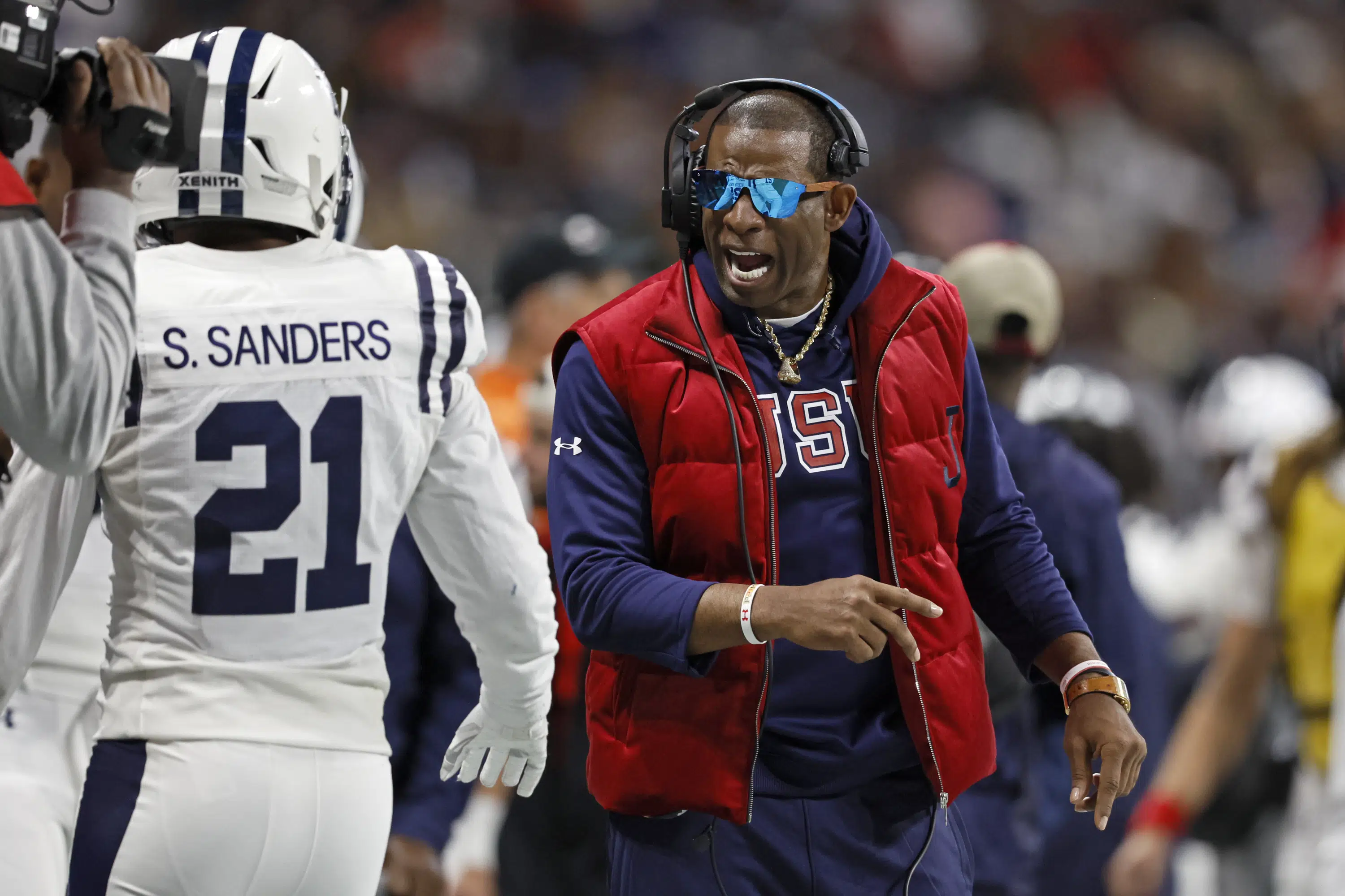 Deion Sanders assembles veteran staff at Colorado | AP News