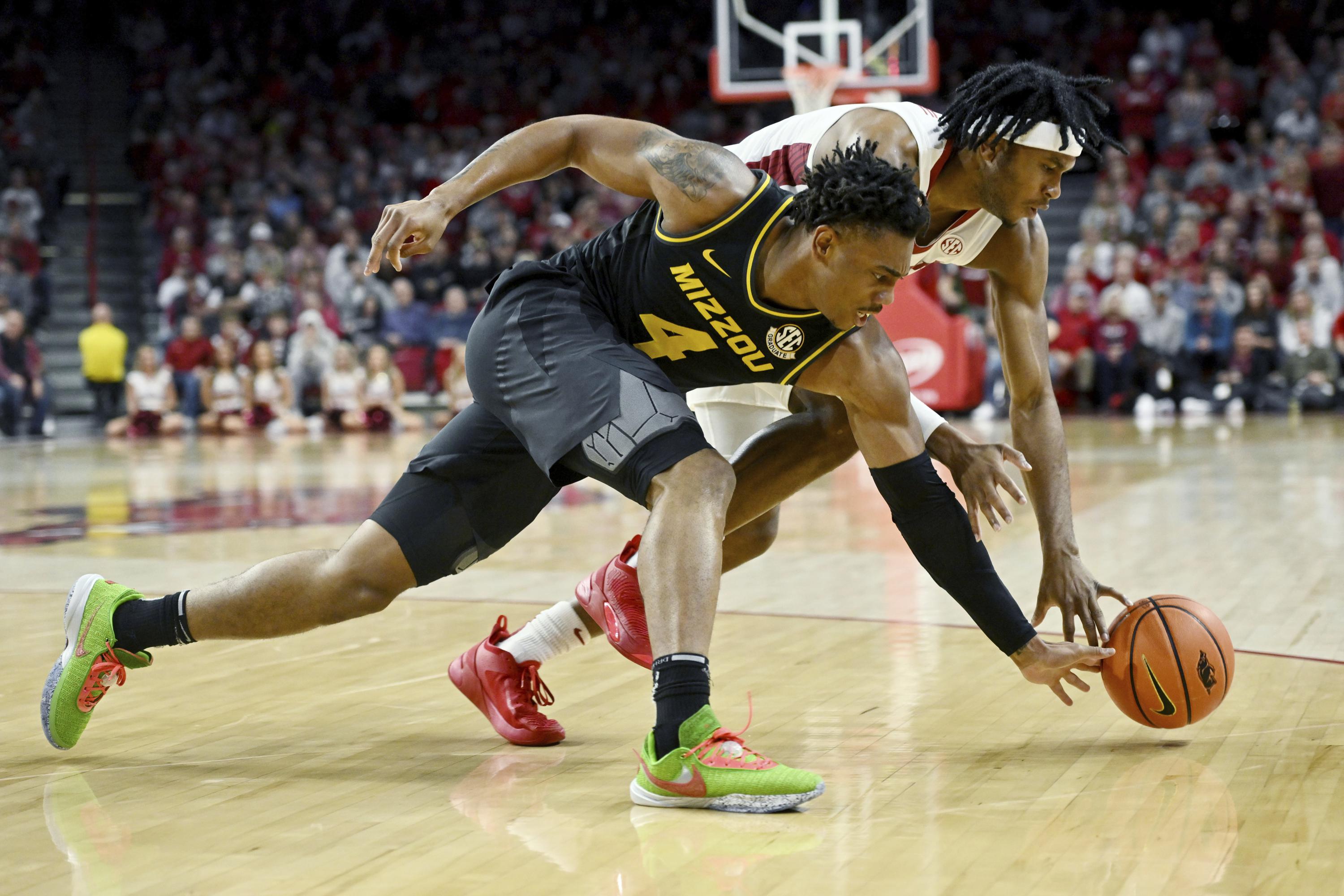 No. 13 Arkansas rallies from 17 down to beat No. 20 Missouri