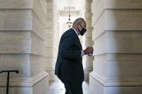 Senate Majority Leader Chuck Schumer, D-N.Y., arrives as senators convene for a rare weekend session to continue work on the $1 trillion bipartisan infrastructure bill, at the Capitol in Washington, Sunday, Aug. 8, 2021. (AP Photo/J. Scott Applewhite)