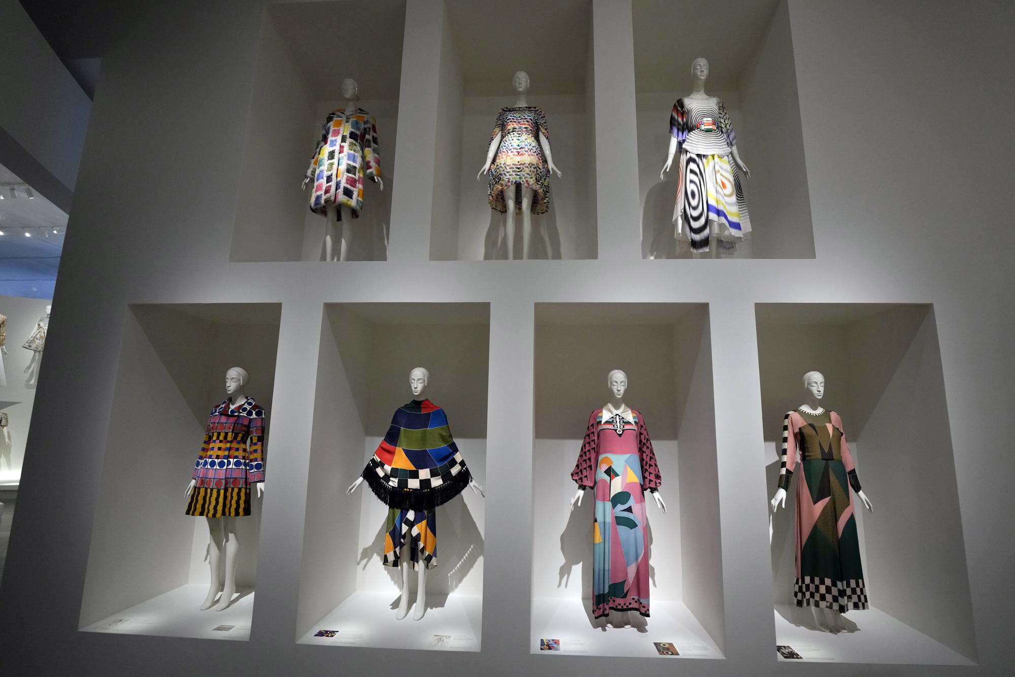 Designs by Karl Lagerfeld are displayed at the Metropolitan Museum of Art's Costume Institute exhibition, "Karl Lagerfeld: A Line of Beauty," on Saturday, April 29, 2023, in New York. (Photo by Charles Sykes/Invision/AP)