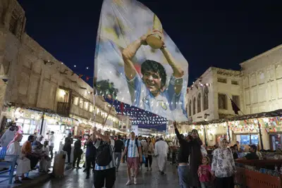 Argentines flock to Qatar for chance to win the World Cup | AP News