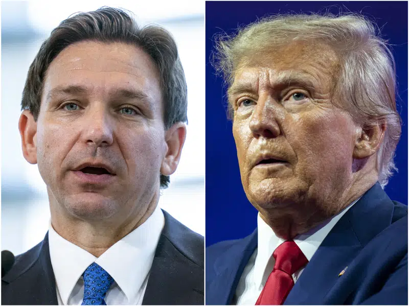 FILE - This combination of photos shows Florida Gov. Ron DeSantis speaking on April 21, 2023, in Oxon Hill, Md., left, and former President Donald Trump speaking on March 4, 2023, at National Harbor in Oxon Hill, Md. DeSantis and Trump will share the spotlight in Iowa on Saturday, May 13, providing a chance to sway influential conservative activists and contrast their campaign styles in Republicans' leadoff voting state. (AP Photo/Alex Brandon, File)