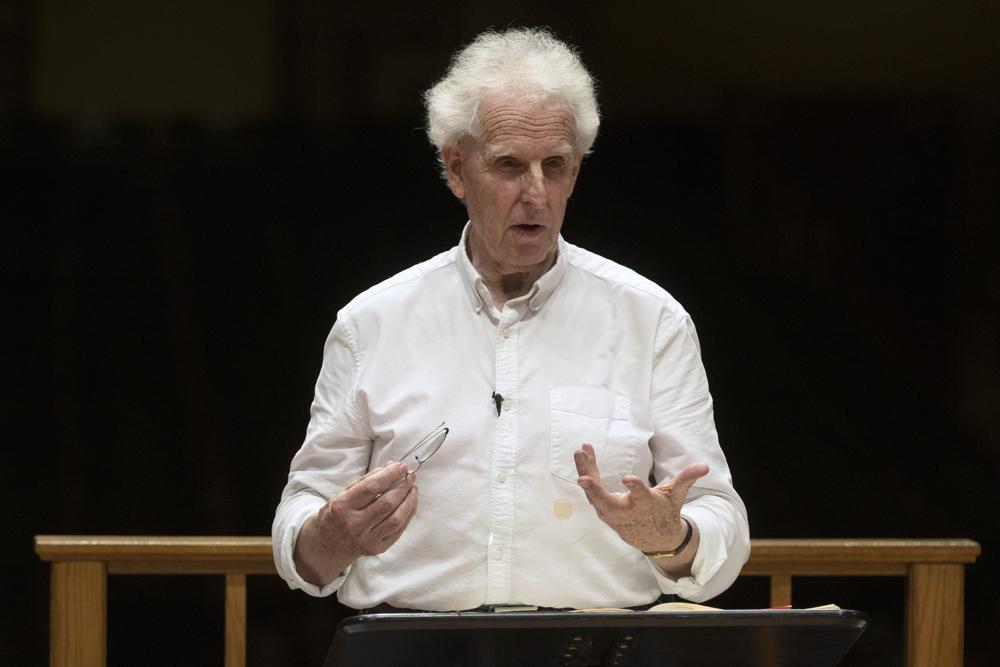 Benjamin Zander speaks to the Boston Philharmonic Orchestra during a rehearsal of Beethoven's Ninth Symphony at Symphony Hall, Sunday, Feb. 19, 2023, in Boston. (AP Photo/Michael Dwyer)