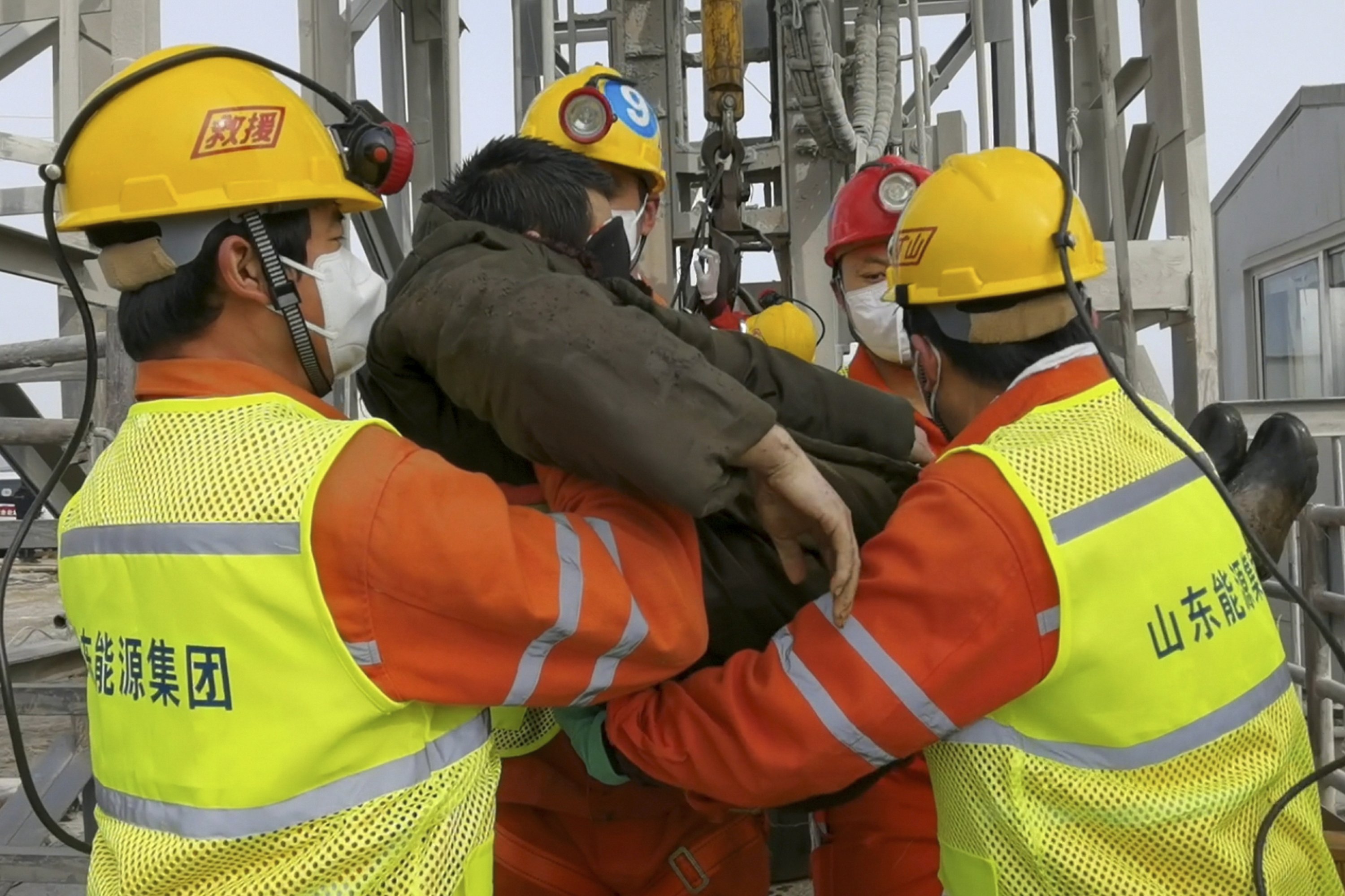 11 workers trapped rescued 11 workers from China gold mine