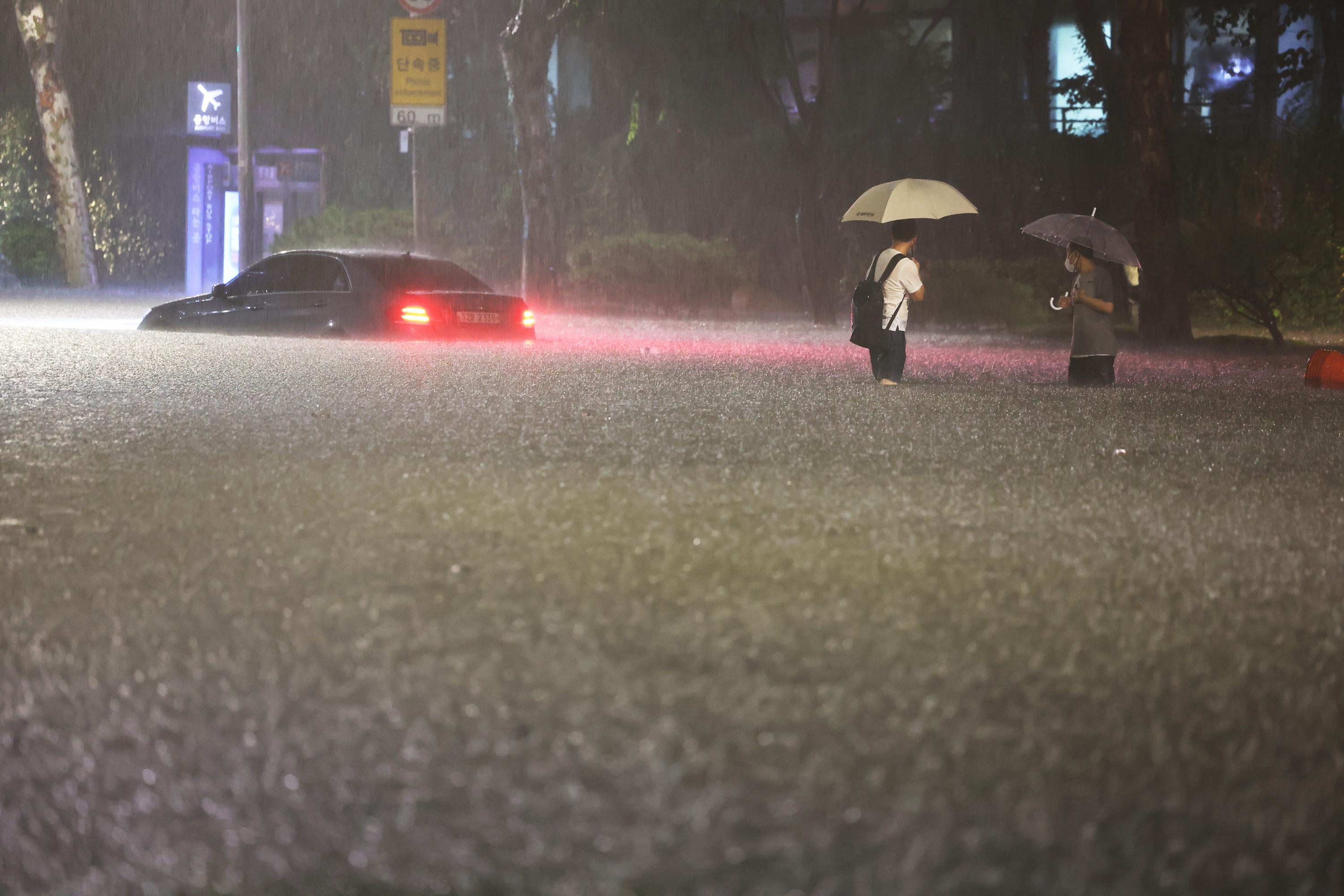 South Korean rain turns roads into rivers, leaves 9 dead