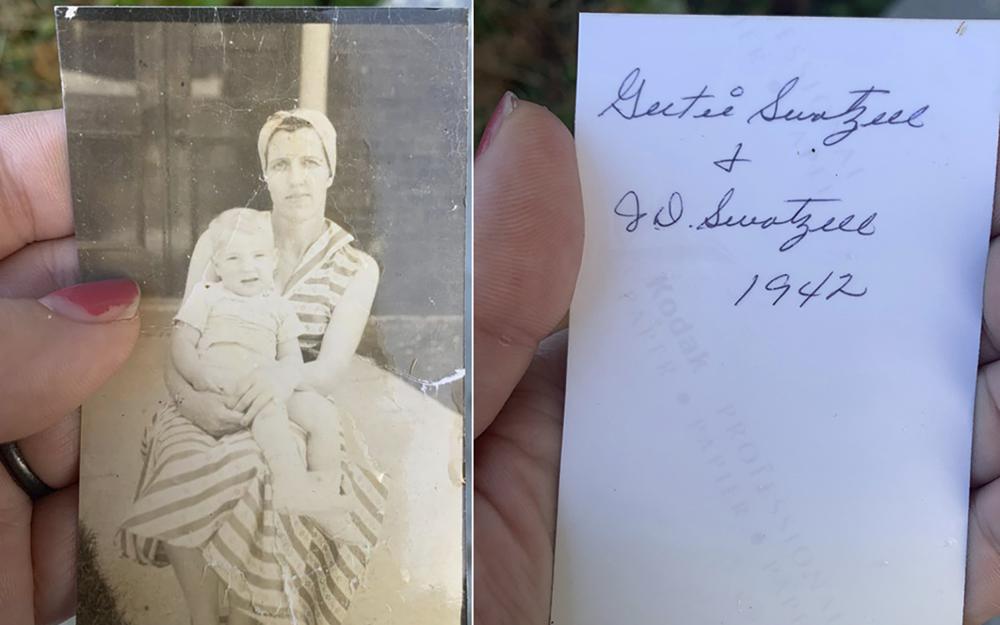 This photo combo shows Katie Posten holding the front and back of a photograph she found stuck to her car's windshield on Saturday, Dec. 11, 2021 in New Albany, Ind. The photo is from a tornado-damaged home in Kentucky that landed almost 130 miles away in Indiana. (Katie Posten via AP).