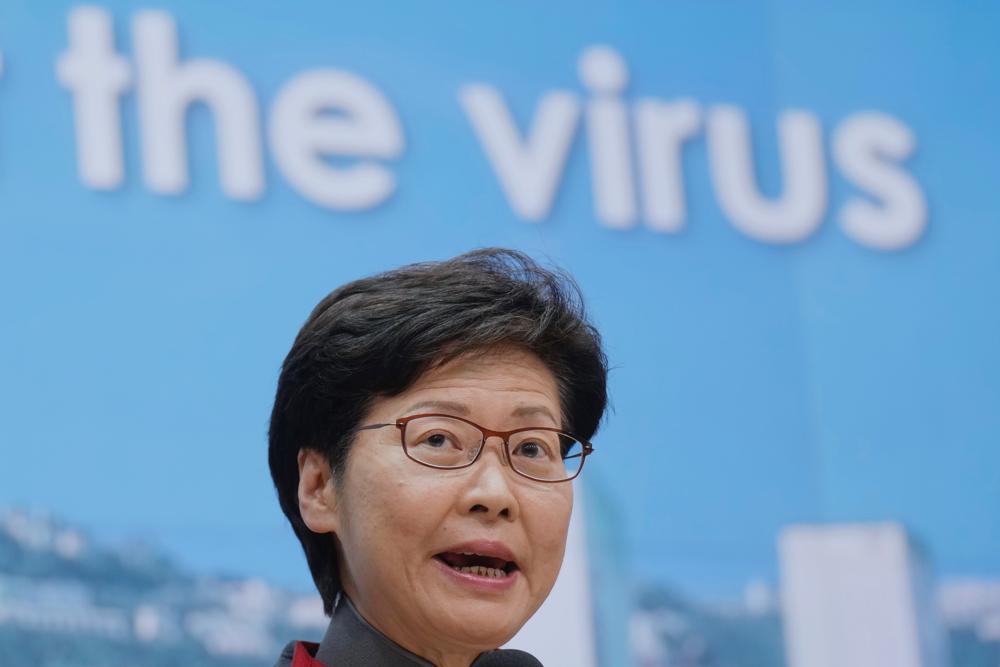 Hong Kong virus cluster in housing prompts partial lockdown