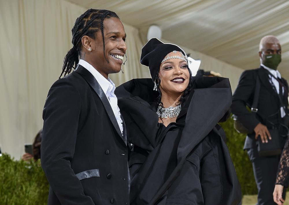 FILE - A$AP Rocky, left, and Rihanna attend The Metropolitan Museum of Art's Costume Institute benefit gala celebrating the opening of the "In America: A Lexicon of Fashion" exhibition in New York on Sept. 13, 2021. (Photo by Evan Agostini/Invision/AP, File)