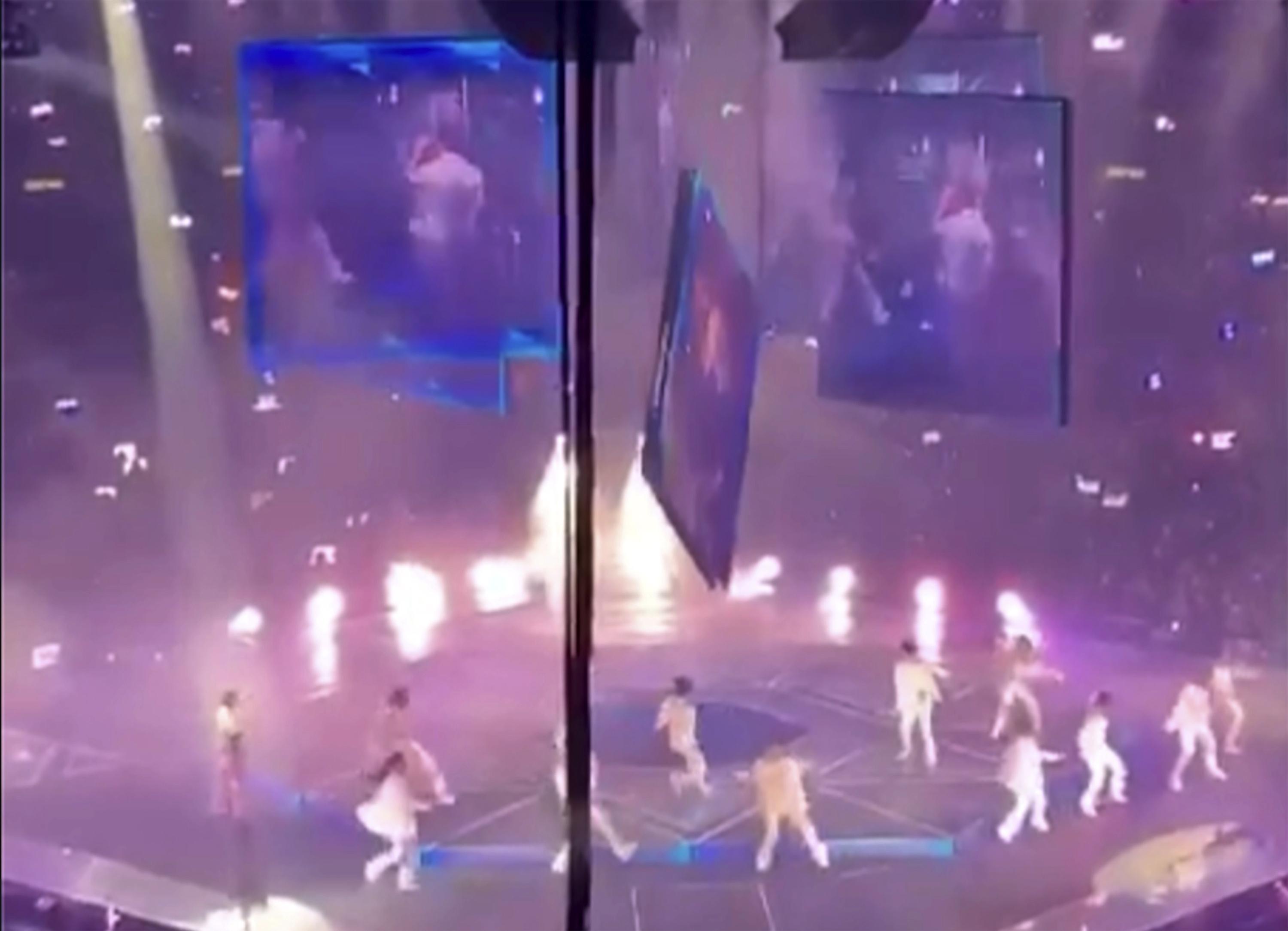 Falling screen hits 2 dancers on stage at Hong Kong concert AP News