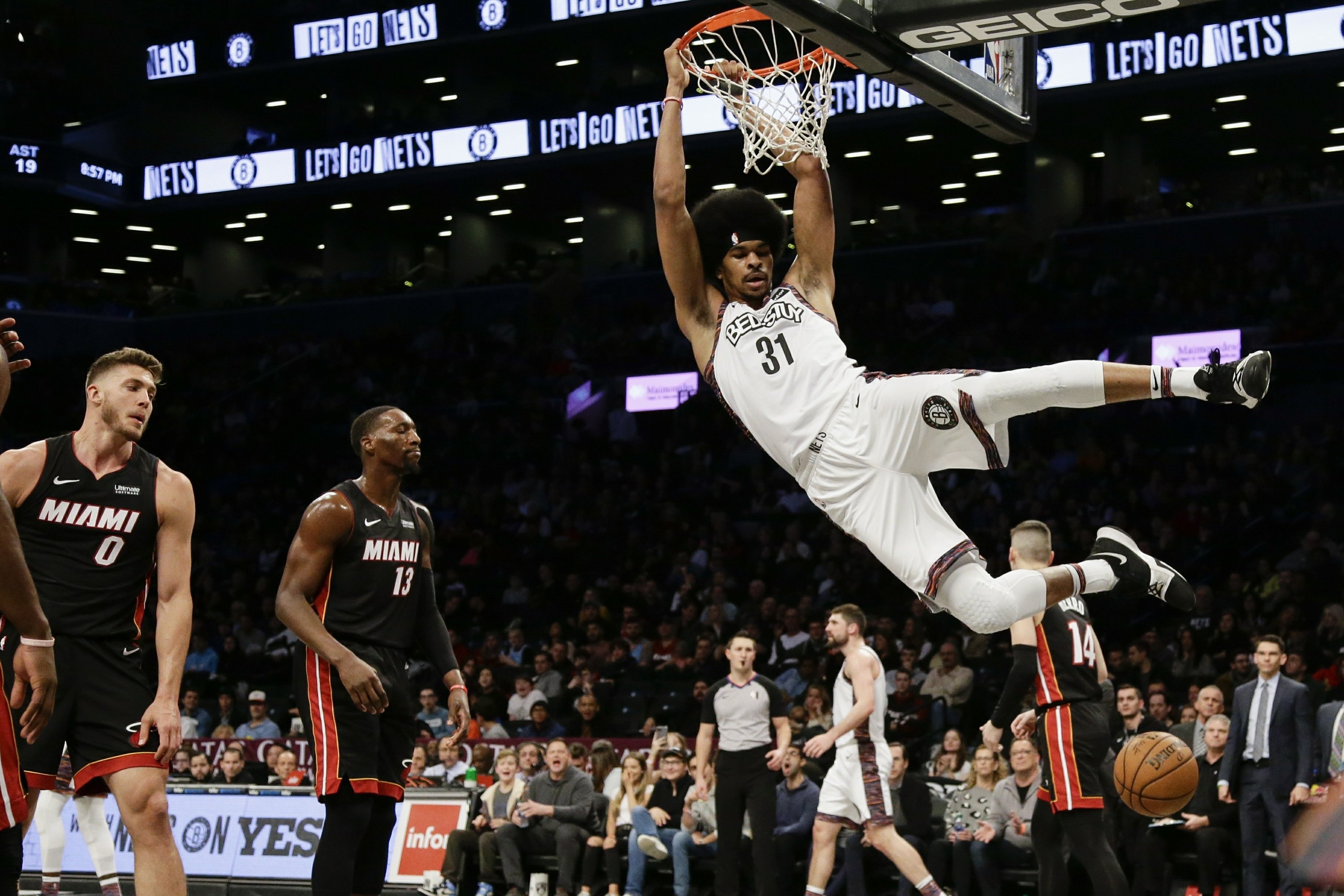 Nets snap 7game skid with 117113 win over Heat AP News