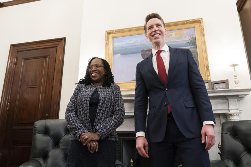 FILE - Supreme Court nominee Judge Ketanji Brown Jackson, left, and Sen. Josh Hawley, R-Mo., stand before their meeting on Capitol Hill, March 9, 2022, in Washington. Judge Jackson's confirmation hearing starts March 21. If confirmed, she would be the court's first Black female justice. (AP Photo/Alex Brandon, File)