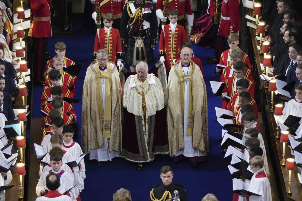 Britain's King Charles III arrives for his coronation at Westminster Abbey, in London, Saturday May 6, 2023. (Andrew Matthews/Pool via AP)