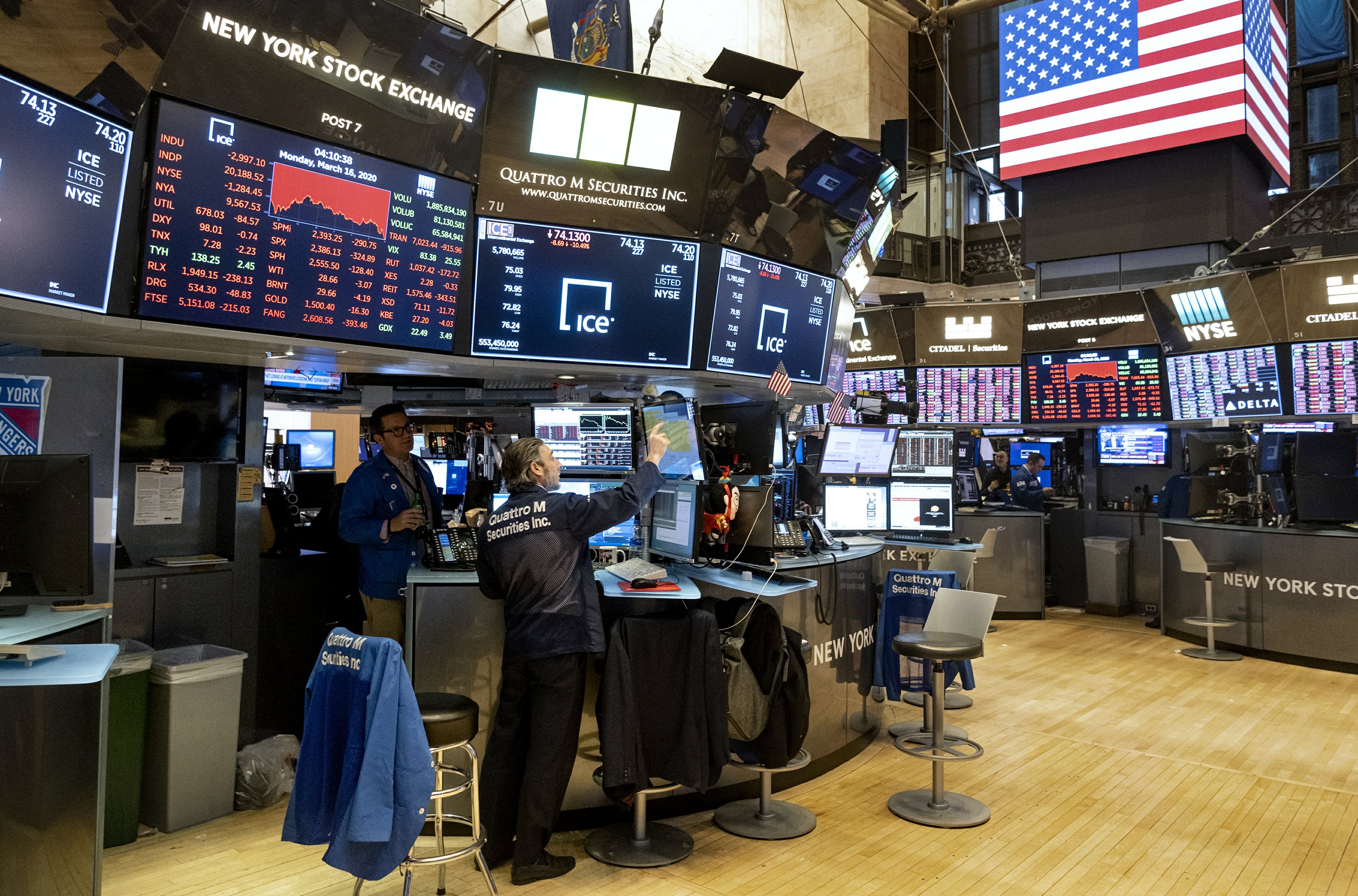 NYSE to partially reopen trading floor after Memorial Day | AP News