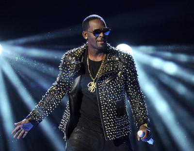 R Kelly Porn - R. Kelly's life, from troubled talent to trafficking trial | AP News
