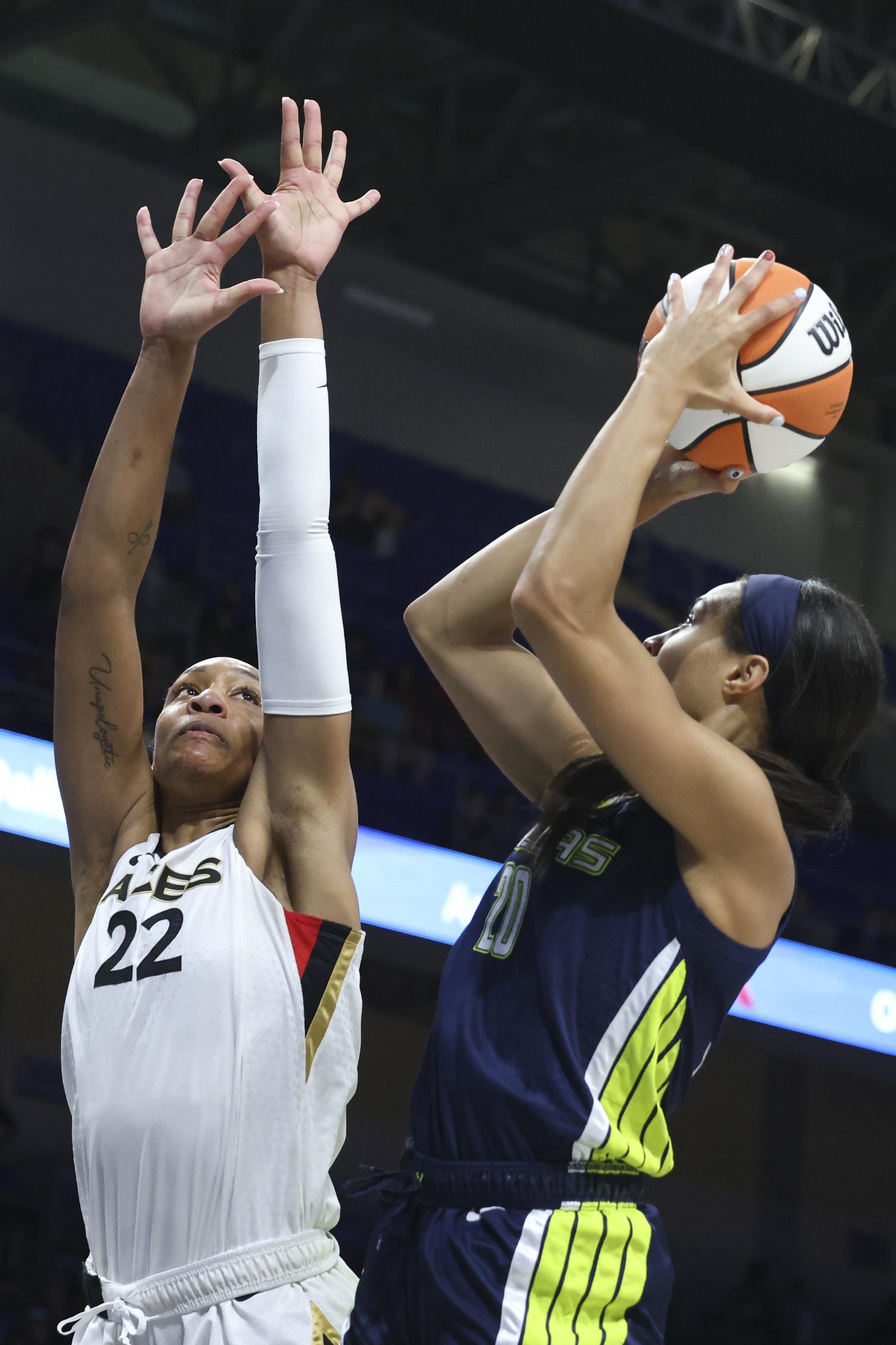 McCowan makes late goahead layup, Wings beat Aces 8280 AP News