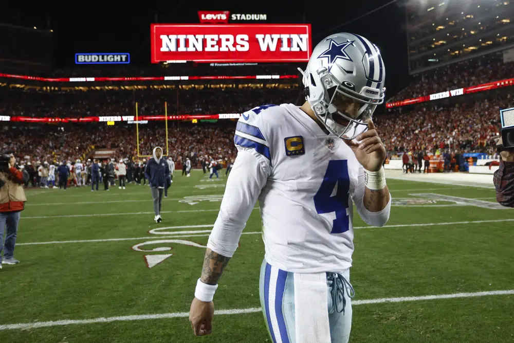 Dallas Cowboys quarterback Dak Prescott (4) walks off the field after an NFL divisional round playoff football game against the San Francisco 49ers in Santa Clara, Calif., Sunday, Jan. 22, 2023. (AP Photo/Josie Lepe)